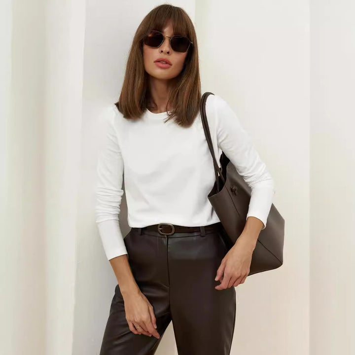 T-shirt donna a maniche lunghe, girocollo, moderna ed elegante. Top casual versatile per autunno/inverno.