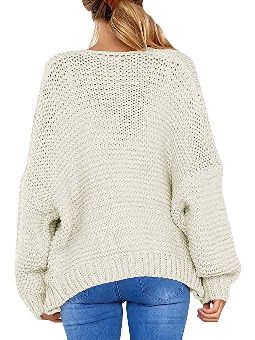 Cardigan donna a maglia grossa con lavorazione a trecce, versatile per strati autunno/inverno casual.