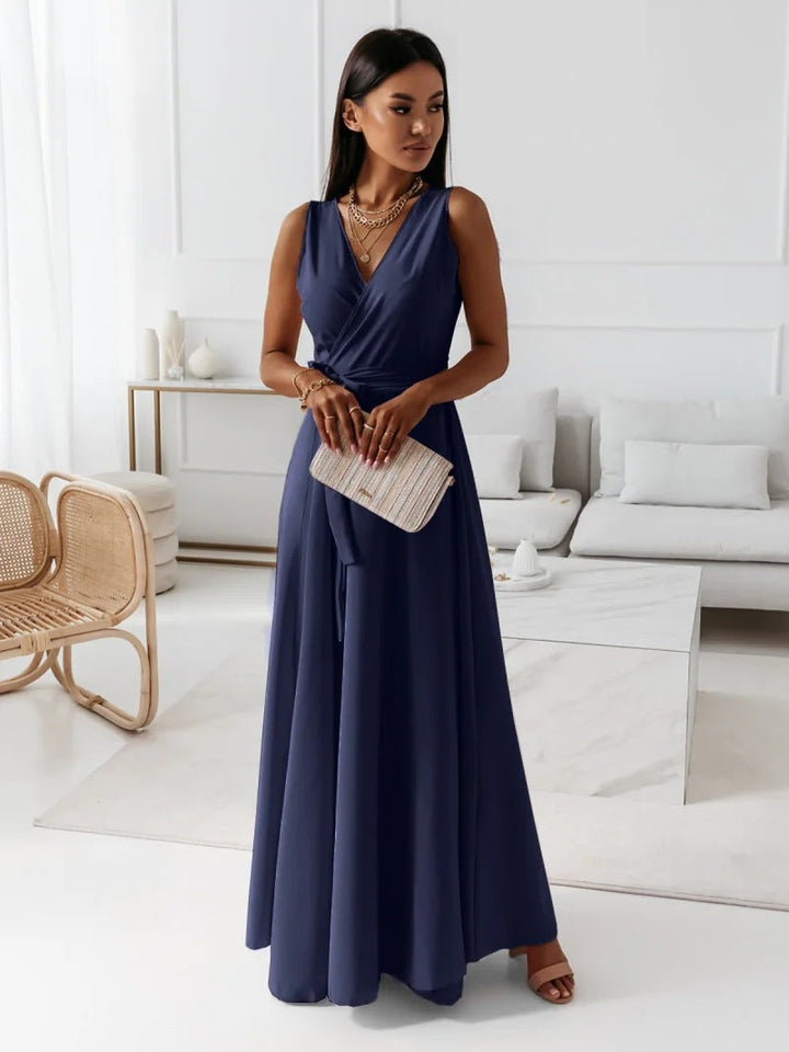 Abito lungo donna con profondo scollo a V, vestito da sera elegante e raffinato per eventi speciali.