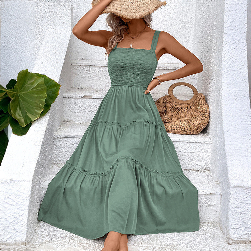 Abito estivo donna con balza e schiena scoperta, stile fluido ed elegante per l'estate.
