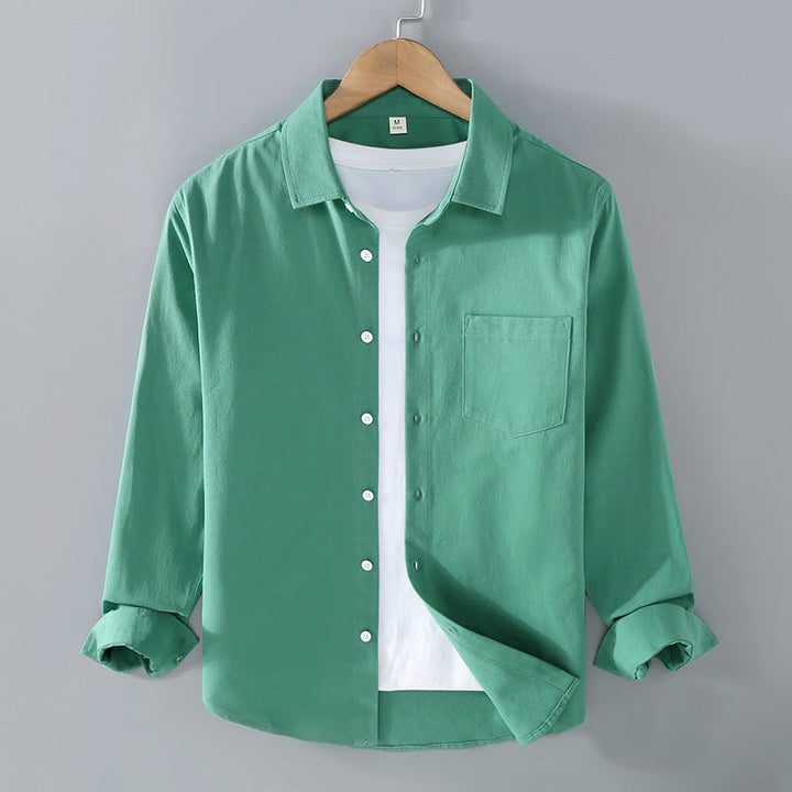 Camicia elegante uomo a maniche lunghe, colletto aperto. Vestibilità morbida, ideale per eventi.