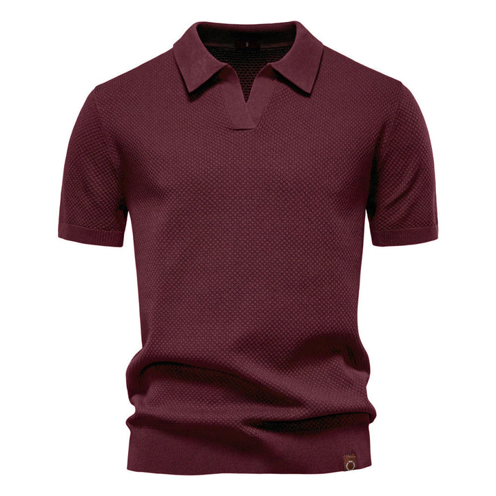 Polo uomo traspirante, in tessuto strutturato per massimo comfort e stile versatile in ogni occasione.