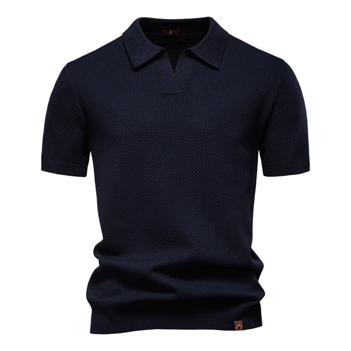 Polo strutturata da uomo, stile moderno e comfort traspirante per un look versatile casual-elegante.