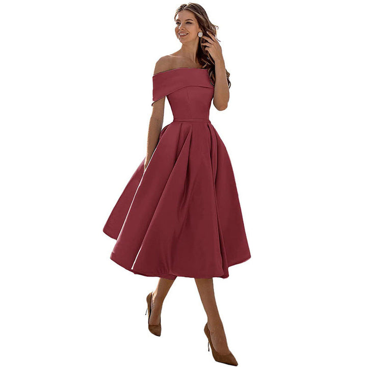 Abito da cerimonia estivo senza spalline, moda donna per un look sofisticato.