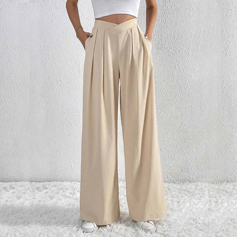 Pantaloni larghi beige da donna a vita alta, leggeri ed eleganti, perfetti per la primavera estate.