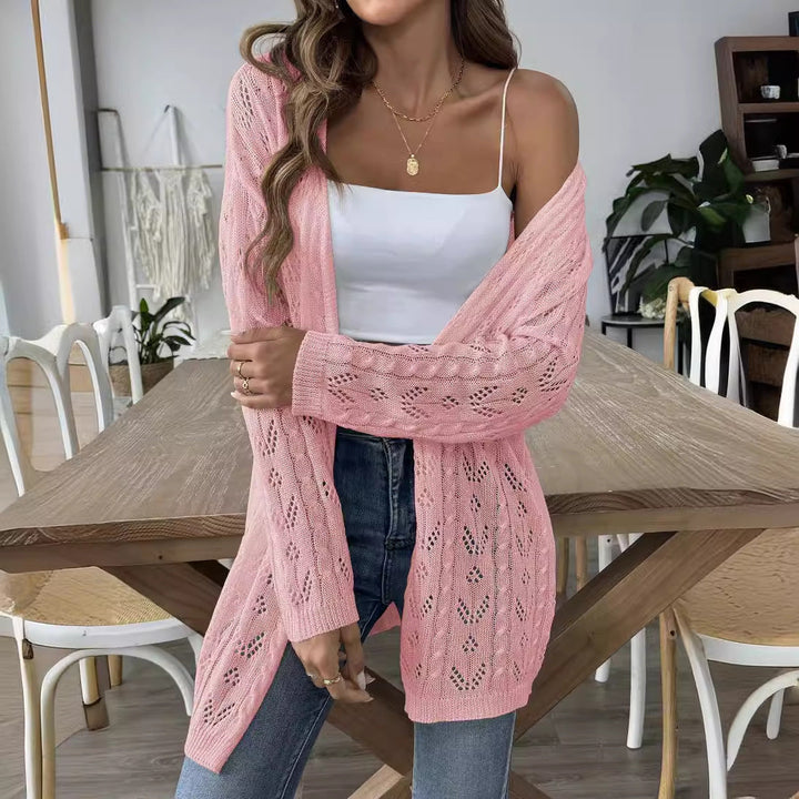 Cardigan estivo traforato da donna, leggero e aperto. Perfetto per outfit casual chic.