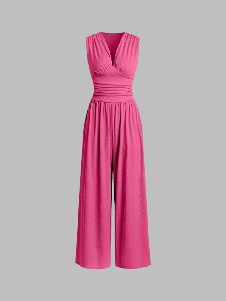 Versatile tuta donna lunga estiva, senza maniche e gamba ampia. Design elegante per un outfit chic e moderno.