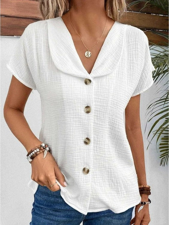 Camicetta donna elegante versatile con collo a bottoni. Ideale per ufficio o casual primavera/estate. Disponibile in bianco.