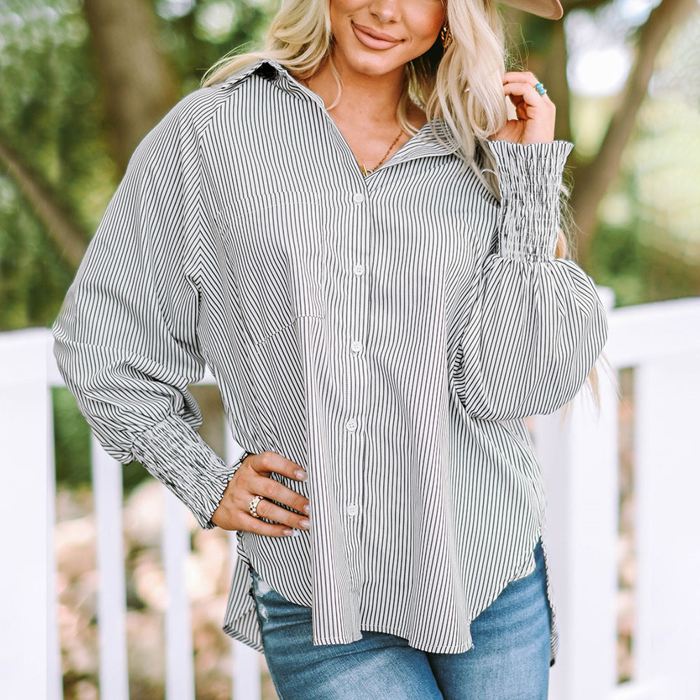 Moderna camicia oversize da donna a righe, maniche lunghe, ideale per un look casual confortevole.