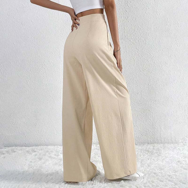 Pantaloni da donna beige a vita alta e gamba larga, un capo comodo ed elegante per un look moderno e raffinato.