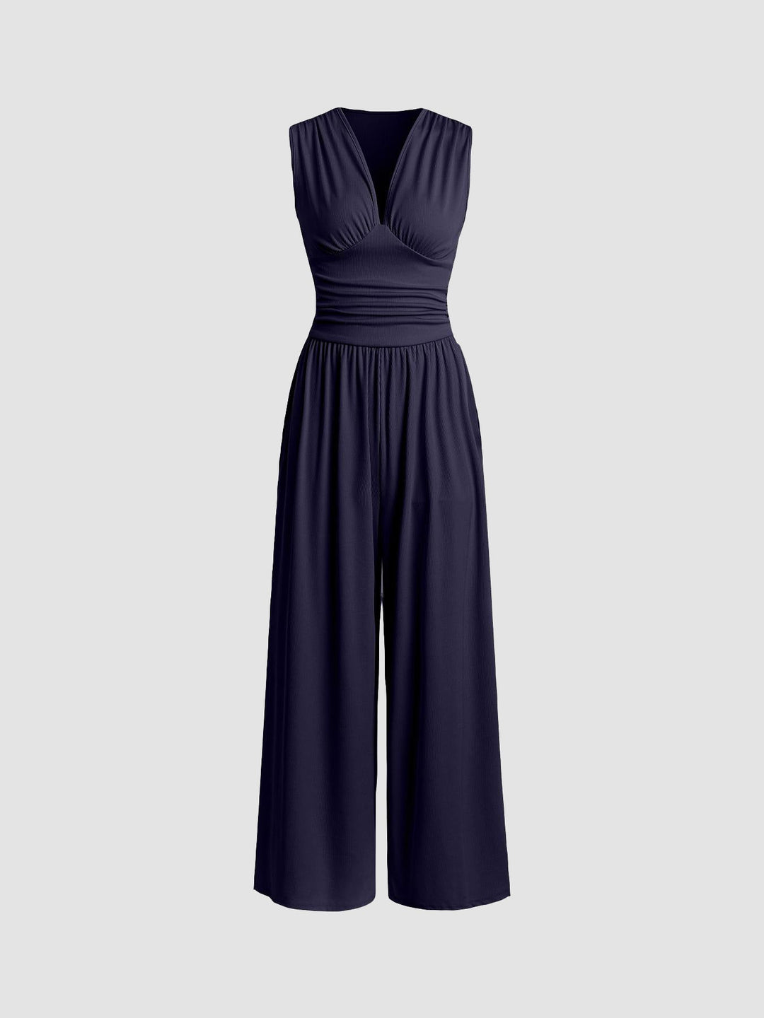 Tuta donna elegante senza maniche, lunga e fluida con gamba ampia. Perfetta per serate estive e moda donna.