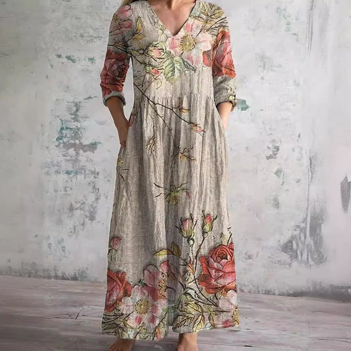 Abito lungo estivo da donna floreale, scollo a V, stile boho. Perfetto per la moda mare e comfort casual.