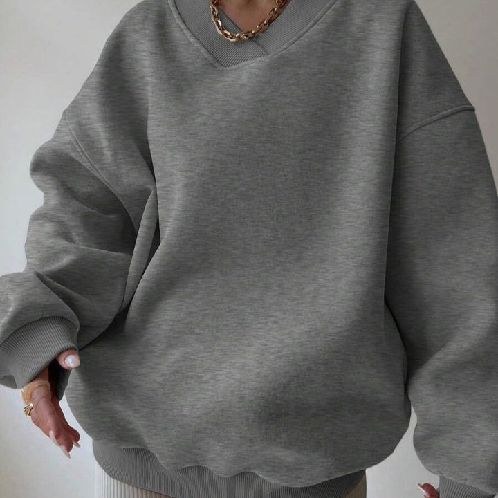 Elegante maglione donna scollo tondo, maniche lunghe. Tinta unita, perfetto per ogni occasione.