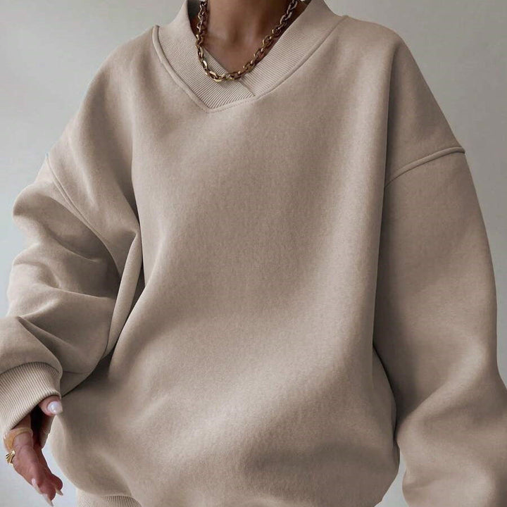 Morbido maglione donna scollo tondo maniche lunghe, in tinta unita. Un must-have versatile.