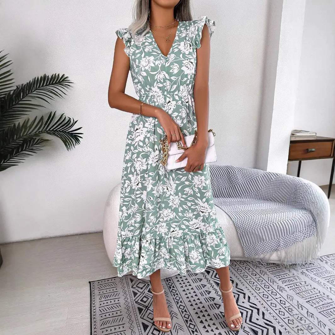 Abito midi estivo casual floreale per donna, con volant e scollo a V. Comodo e chic per ogni occasione. Colori vari.