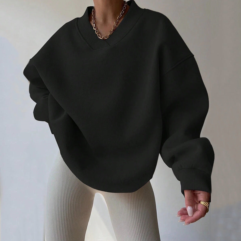 Maglia donna casual elegante, scollo tondo, maniche lunghe. Comfort e stile per l'autunno.