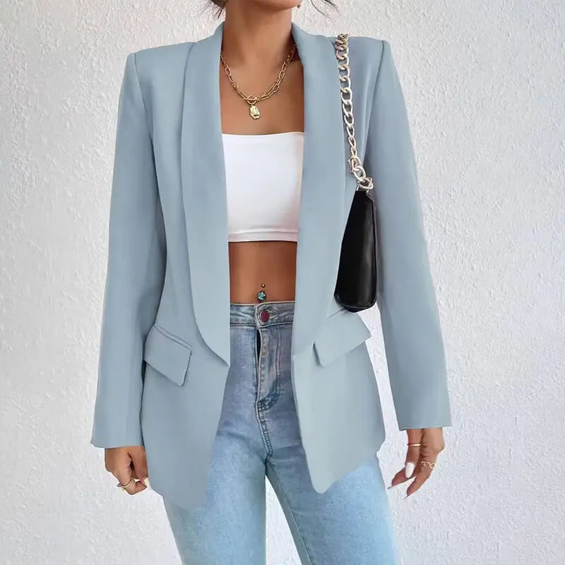 Elegante blazer lungo donna, outerwear di tendenza con collo a scialle per un look contemporaneo e chic.