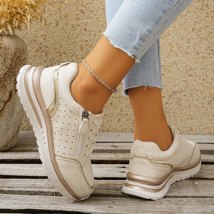 Sneakers donna grigie con supporto arco e cerniera laterale, ideali per camminata confortevole e look casual.