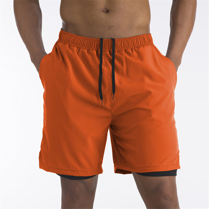Pantaloncini uomo sportivi. Dettaglio fodera interna e tasca telefono. Ideali per corsa, palestra e allenamento.