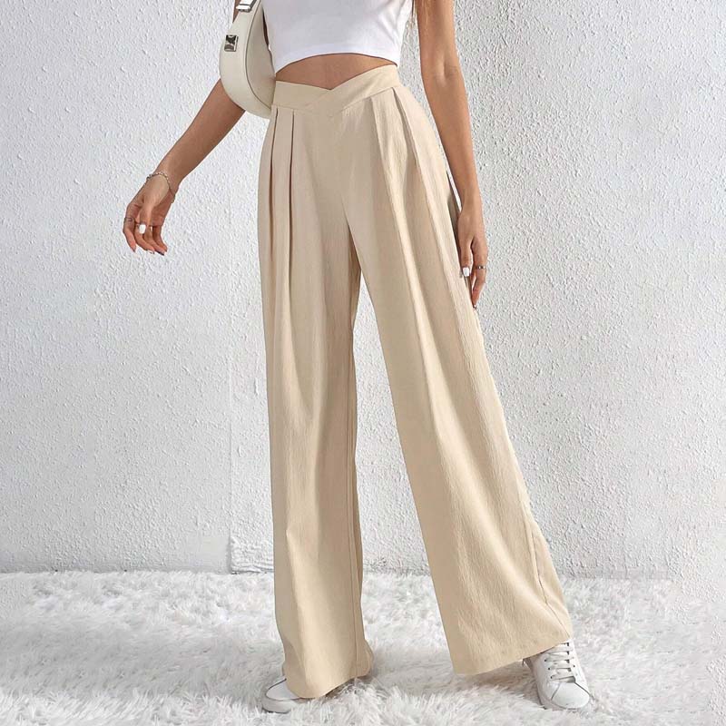 Eleganti pantaloni larghi donna beige a vita alta, versatili per outfit casual o chic, primavera estate.