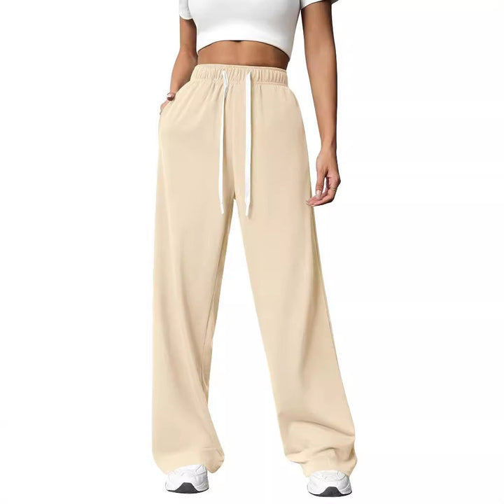 Eleganti pantaloni jogger donna casual, vestibilità ampia, perfetti per sport leggero o tempo libero.