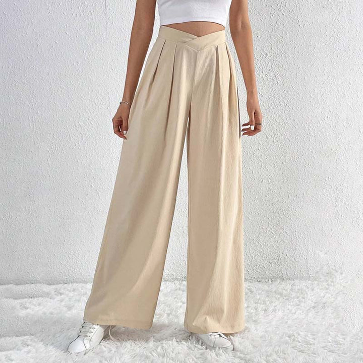 Pantaloni donna beige a gamba larga, vita alta, comodi ed eleganti per look casual chic primavera/estate.