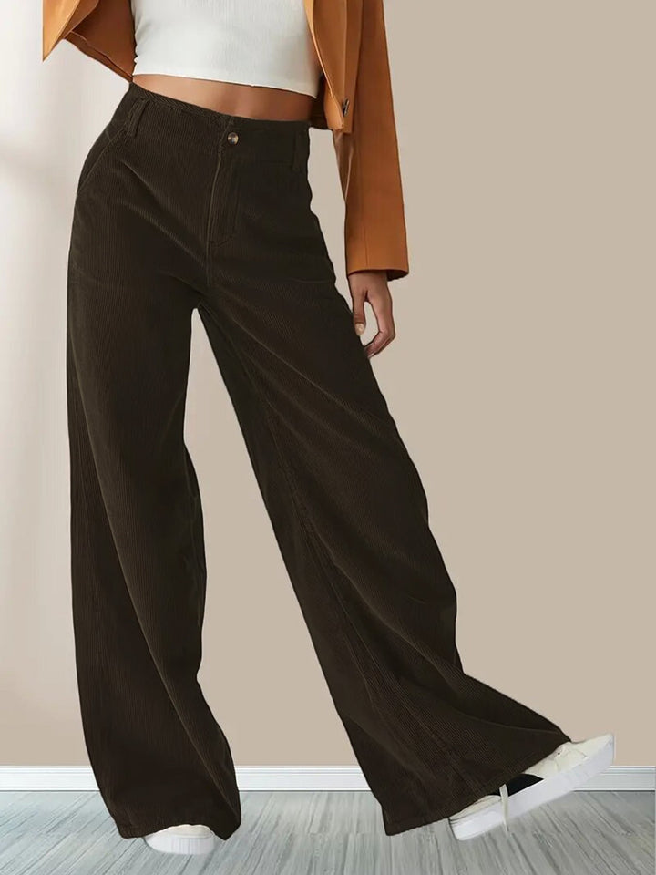 Pantaloni donna a vita alta, gamba larga, in colore neutro. Design comodo ed elegante per ogni occasione casual.