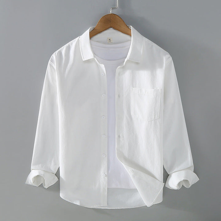 Camicia uomo comoda, maniche lunghe, colletto aperto. Vestibilità morbida, look casual versatile.
