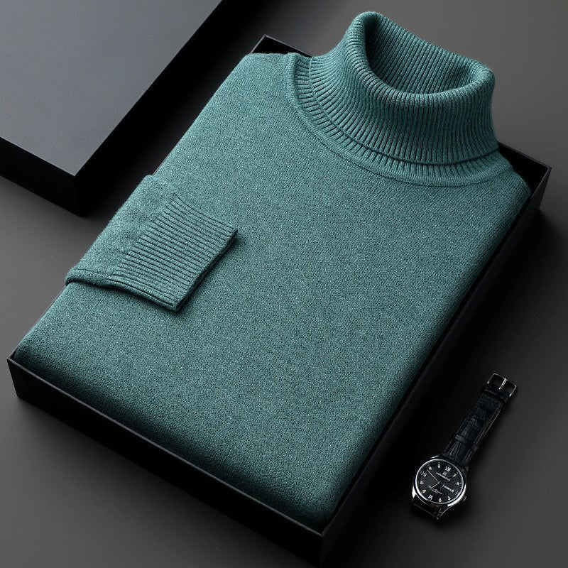 Primo piano del colletto lavorato a maglia del maglione da uomo, caldo e sofisticato per l'inverno.