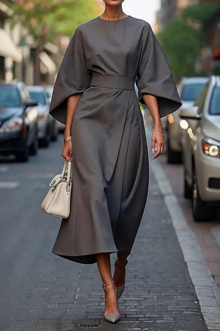 Abito formale midi donna, maniche larghe confortevoli. Un vestito elegante e moderno per eventi speciali.
