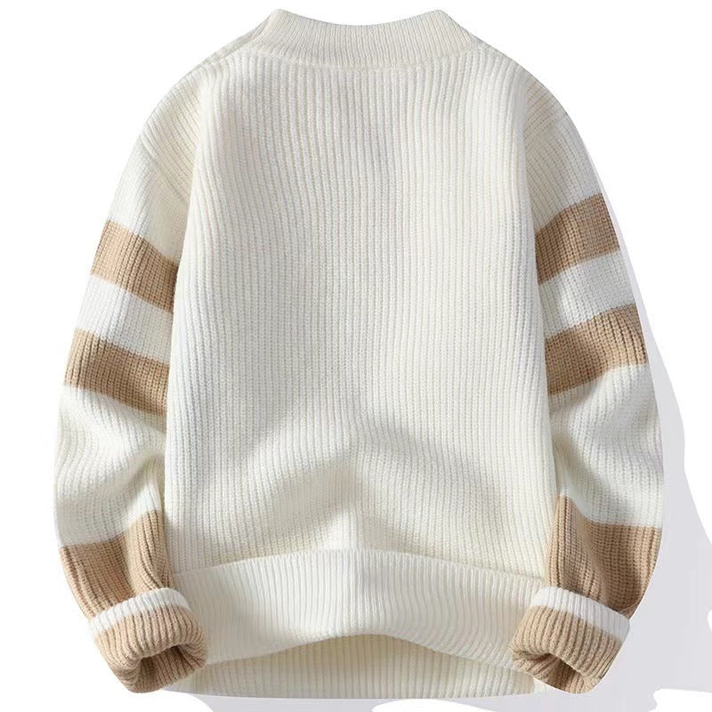 Maglione uomo girocollo patchwork. Perfetto per outfit autunnali casual ed eleganti. Massima versatilità e comfort.