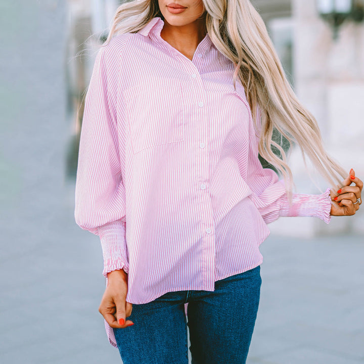 Camicia donna a righe verticali, taglio oversize, abbottonata. Essenziale per moda primaverile estiva.
