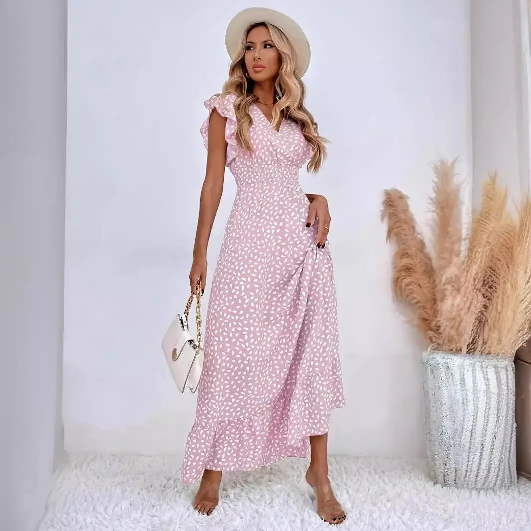Abito midi estivo donna a pois con scollo a V, balze e maniche a volant per un look elegante e versatile.