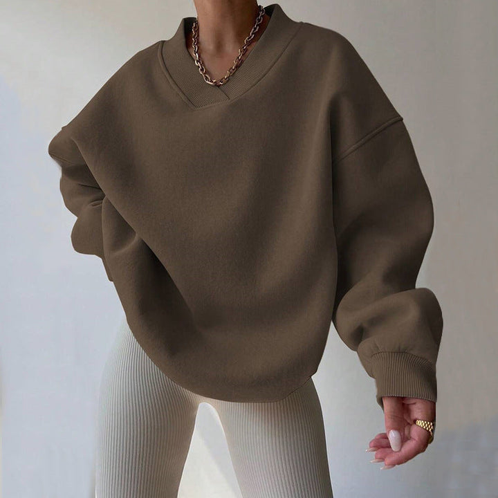 Maglione donna versatile scollo tondo, maniche lunghe, tinta unita. Perfetto per ogni outfit.