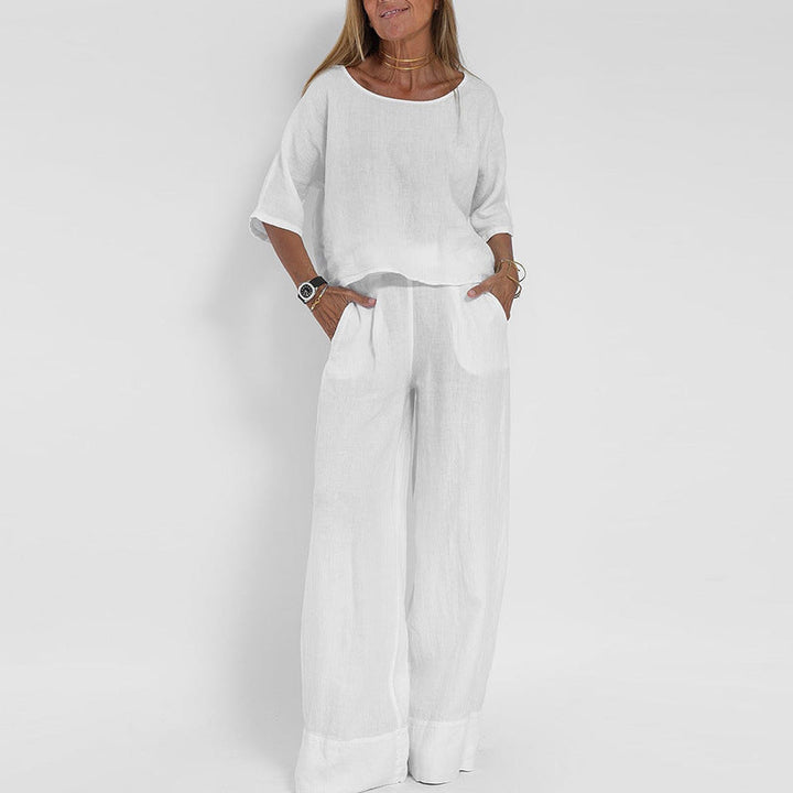 Completo donna estivo con top e pantaloni ampi, perfetto per eleganza quotidiana e un abbigliamento comodo.