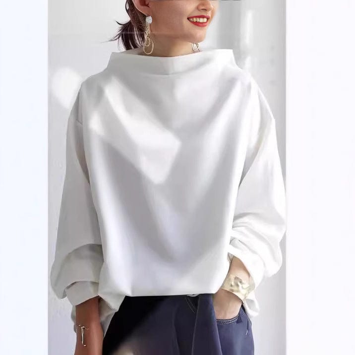Top da donna blu a collo alto, un capo essenziale per la moda femminile, comodo, chic e di tendenza.