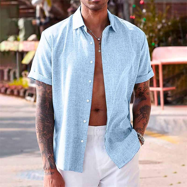 Dettaglio tessuto camicia uomo traspirante e leggera, ideale per l'estate e il comfort tutto l'anno.