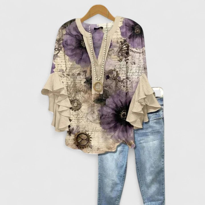 Moda femminile: camicetta floreale donna versatile, elegante, vestibilità comoda, colori vivaci.