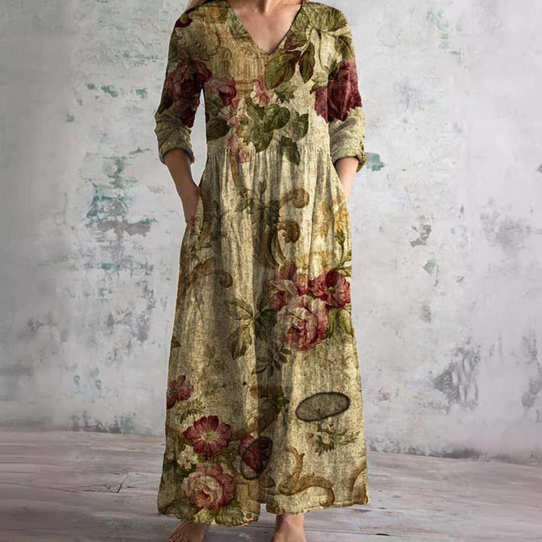 Abito lungo da donna in fucsia con stampa floreale, scollo a V. Stile boho per un look estivo e confortevole.