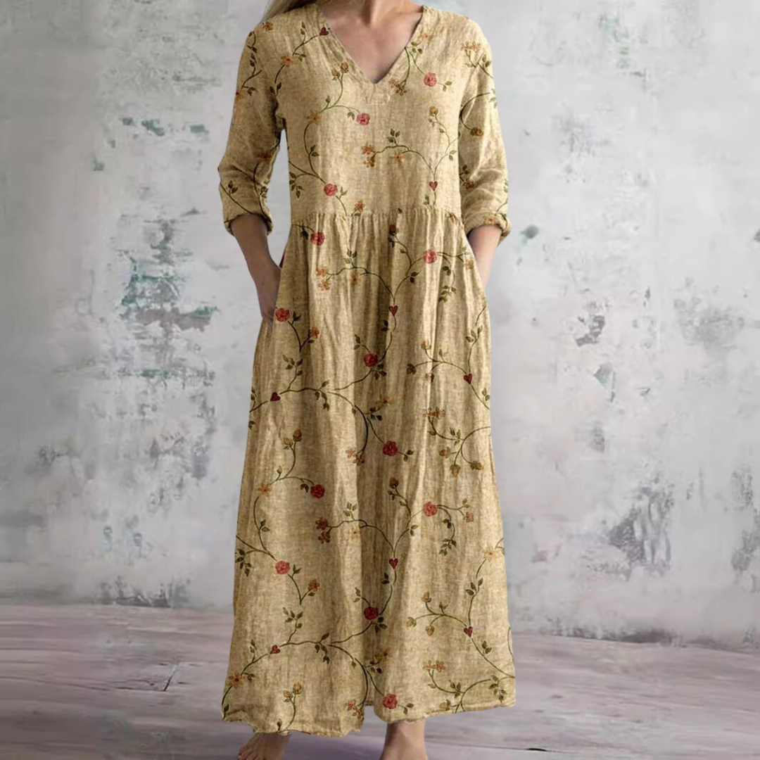Abito fluido estivo da donna, stampa floreale con scollo a V. Look boho chic per comfort estivo e casual.