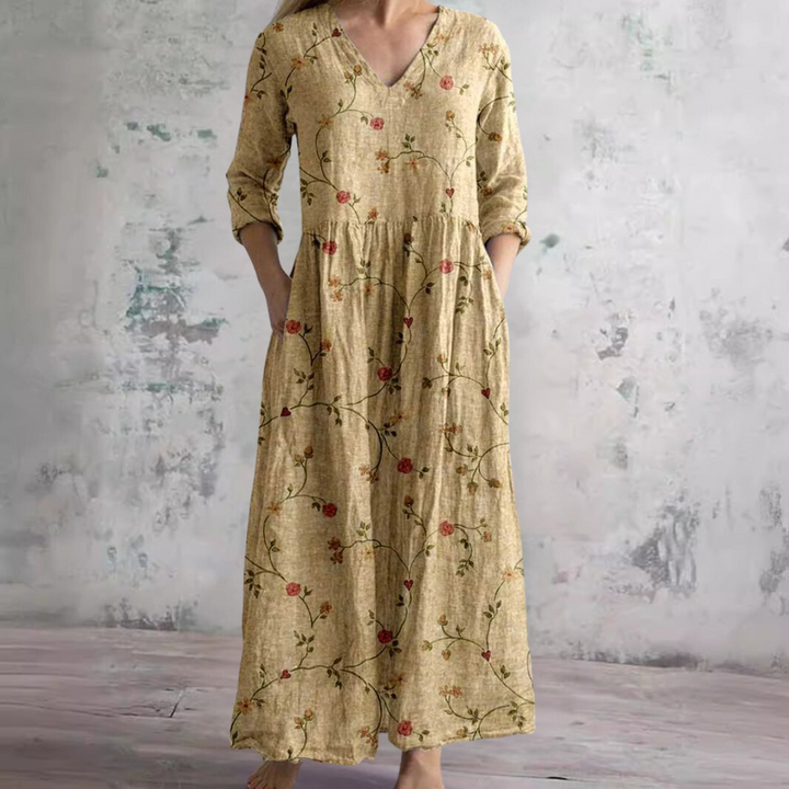 Abito fluido estivo da donna, stampa floreale con scollo a V. Look boho chic per comfort estivo e casual.