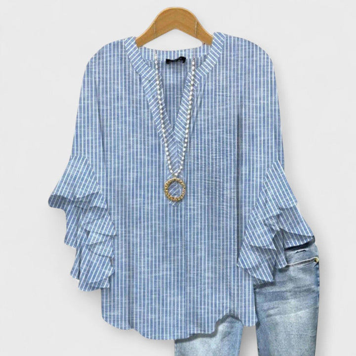 Abbigliamento femminile estivo: t-shirt elegante e versatile. Perfetta per ogni occasione casual.