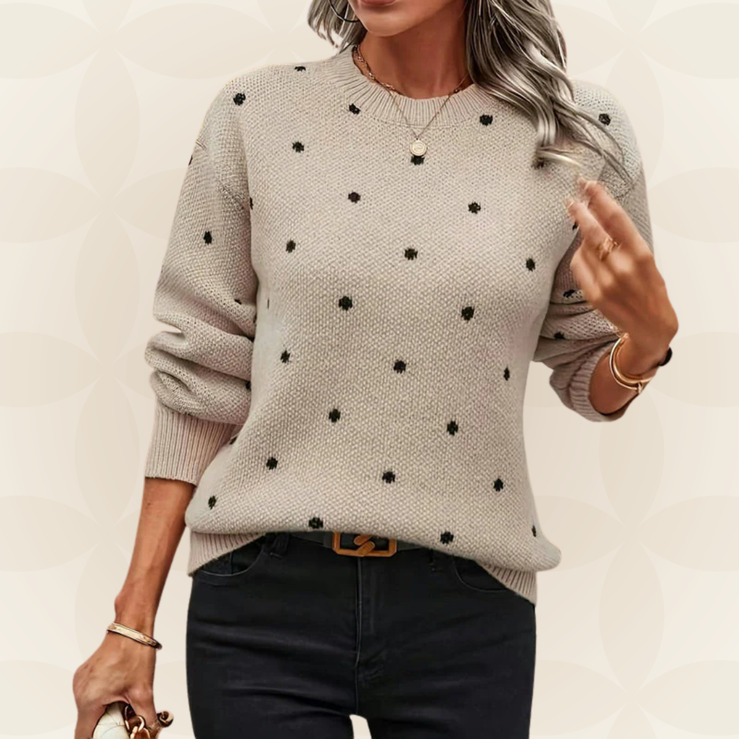 Maglione donna elegante a pois con scollo tondo e maniche lunghe. Perfetto per un look casual chic versatile.