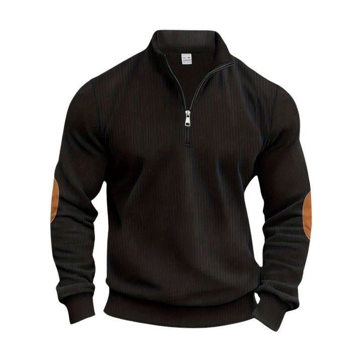 Elegante maglione uomo pullover versatile, con polsini a coste. Ideale per outfit casual chic e moda invernale maschile.