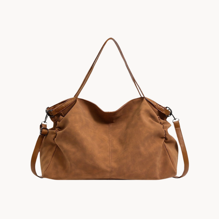 Chic borsa tote grande in pelle per donna, perfetta per un look elegante e funzionale ogni giorno in città.