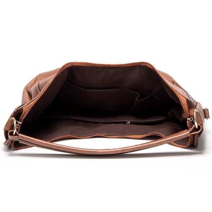 Borsa a tracolla spaziosa da donna con eleganti nappine, perfetta per contenere tutto l'essenziale con stile.