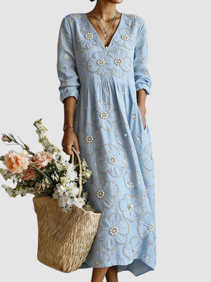 Vestito floreale midi da donna blu per cerimonie autunnali ed eventi. Stampa floreale, abito versatile ed elegante.