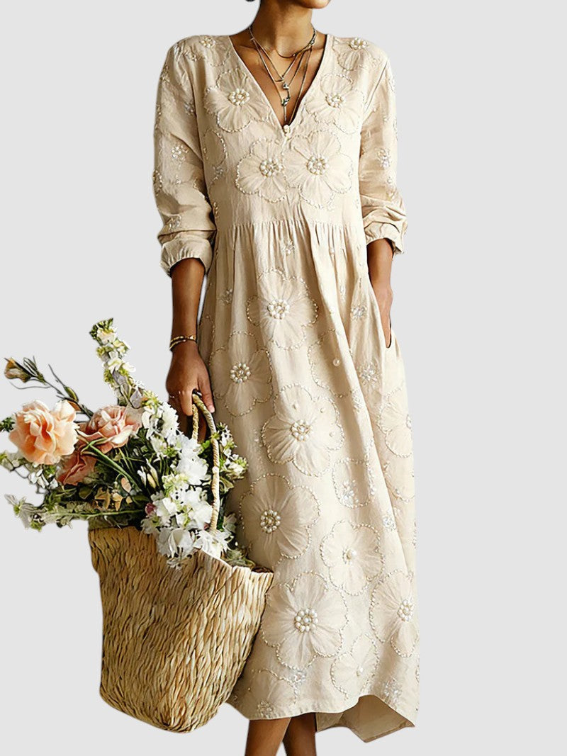 Elegante vestito floreale midi beige da donna, per cerimonie e eventi autunnali. Perfetto per outfit chic.