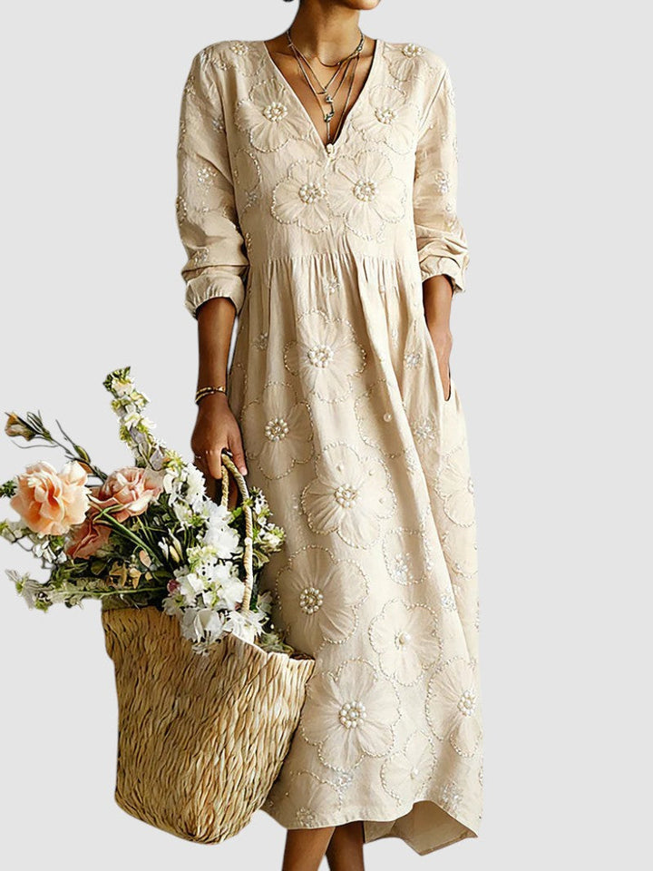 Elegante vestito floreale midi beige da donna, per cerimonie e eventi autunnali. Perfetto per outfit chic.