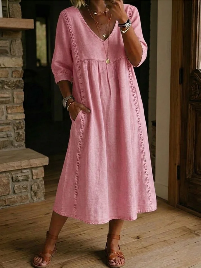 Vestito midi casual da donna morbido, con tasche pratiche, ideale per il look quotidiano e un tocco femminile.